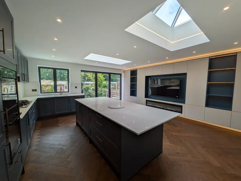 Kitchen extension: LED-edged rooflights and downlights over the island