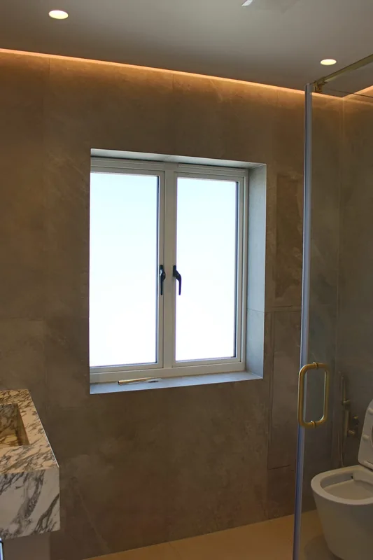 Shower room: Concealed LED cove lighting around the ceiling