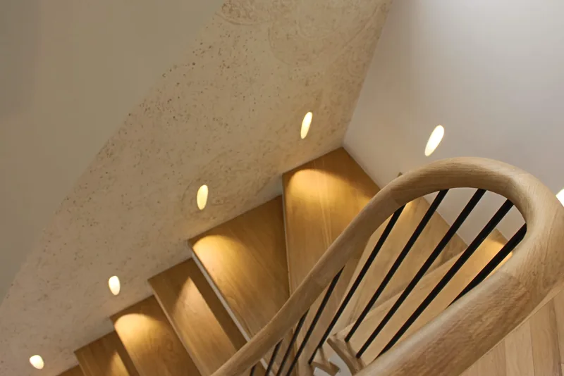 Staircase: Low-level step lights on every tread