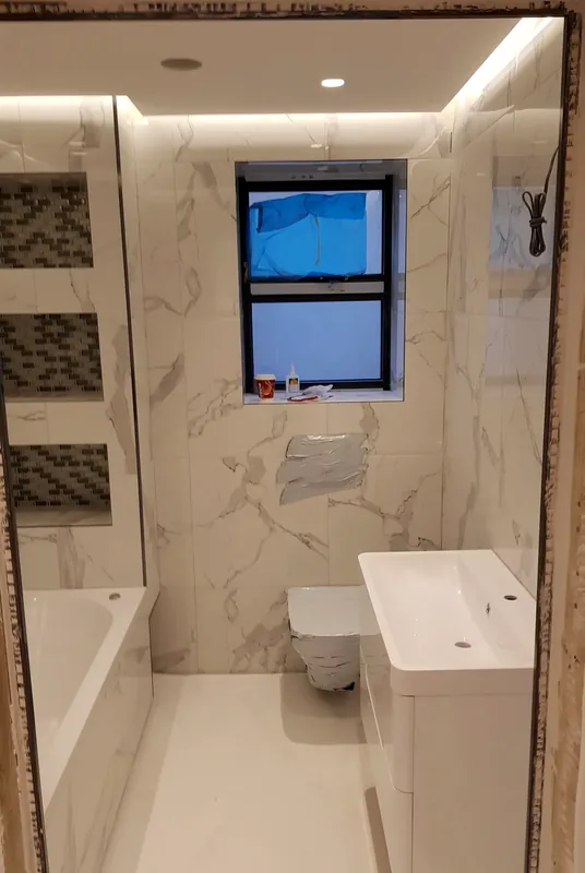 Marble bathroom: LED lighting in the shower niche and ceiling