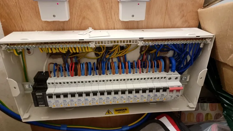 Newly wired consumer unit with neatly dressed cables