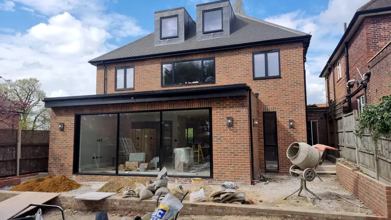 Rear extension: New outdoor lights on a full-width glazed extension