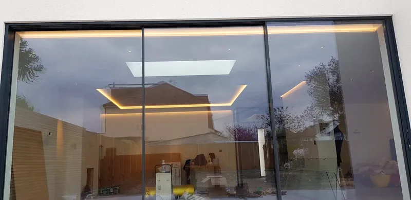 Rear extension: LED cove lighting around a skylight