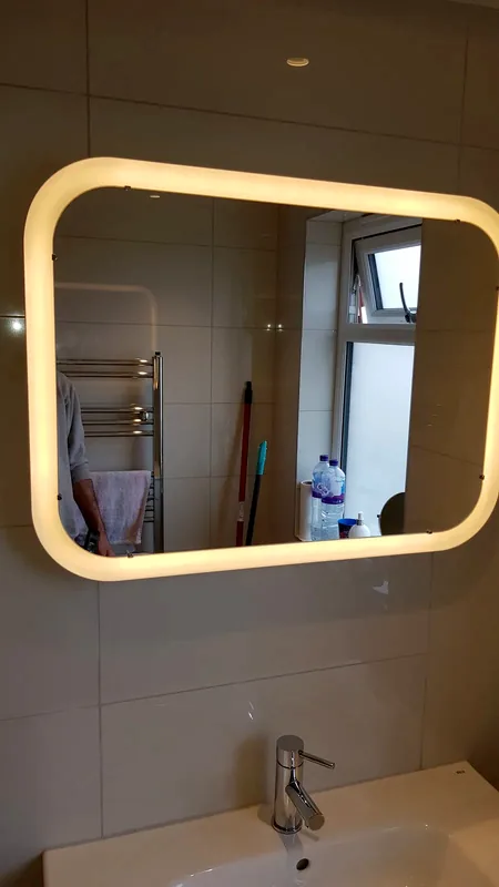 Bathroom: Mirror with built-in LED lighting