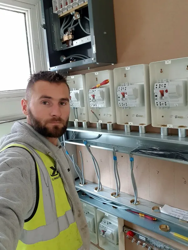 E.A Electrician on site at a multi-meter installation