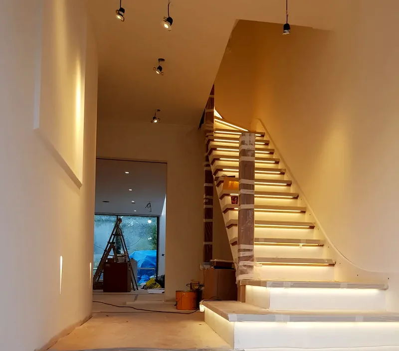 Staircase: LED strip lighting under every tread